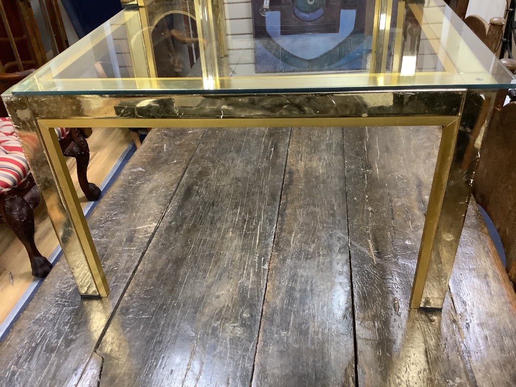 Two Italian Romeo Rega brass glass top low tables, circa 1970, larger 130cm, height 60cm